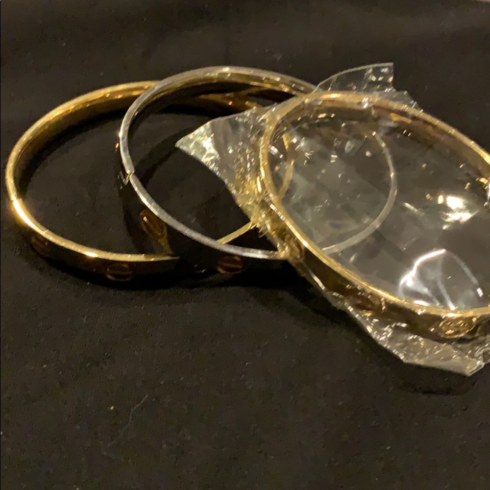 Bangle Bracelet. BNWOT Gold and Silver opens.